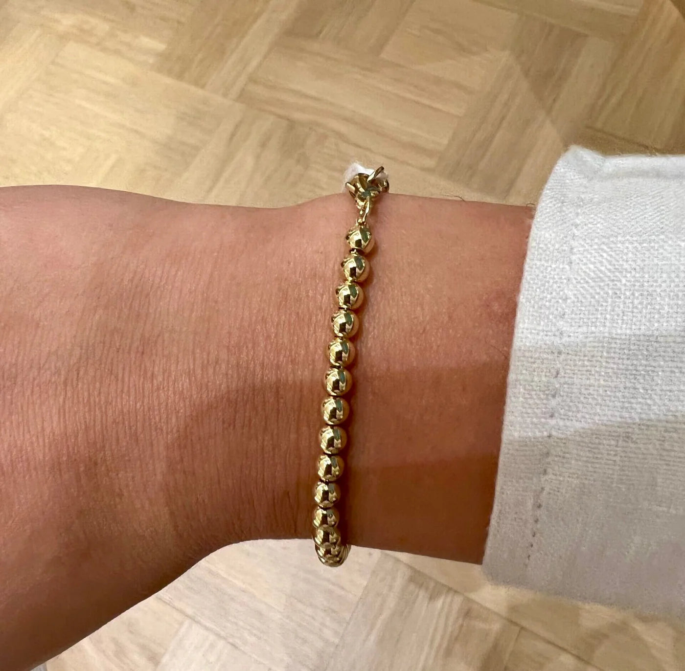צמיד חרוזים גולד בידס · Beads Bracelet